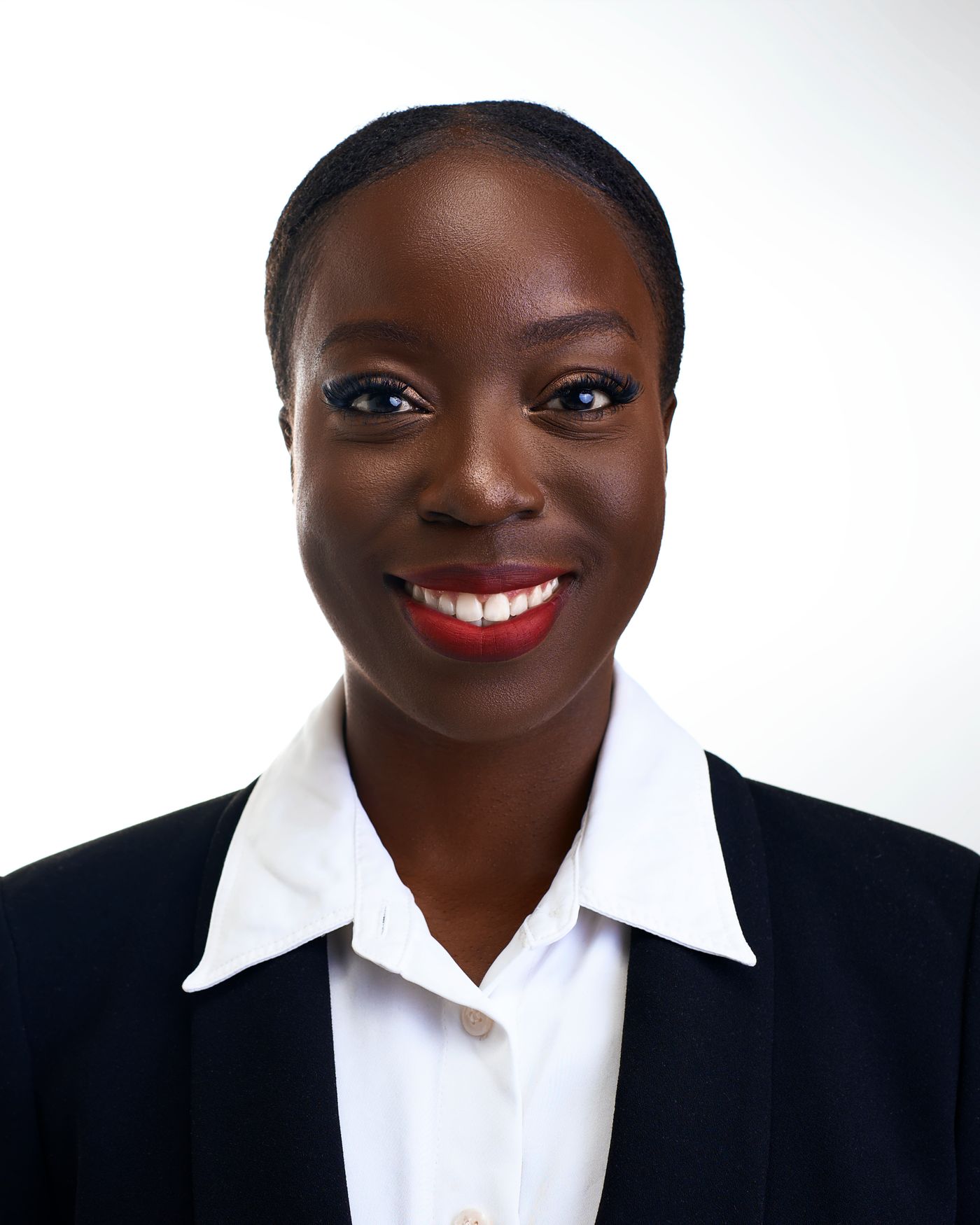 The goal: a sharp, friendly headshot on a clean neutral background — indistinguishable from a studio session